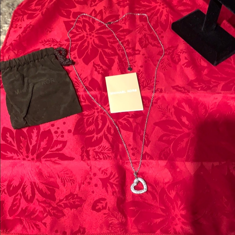 Authentic Silvertone Michael Kors heart necklace